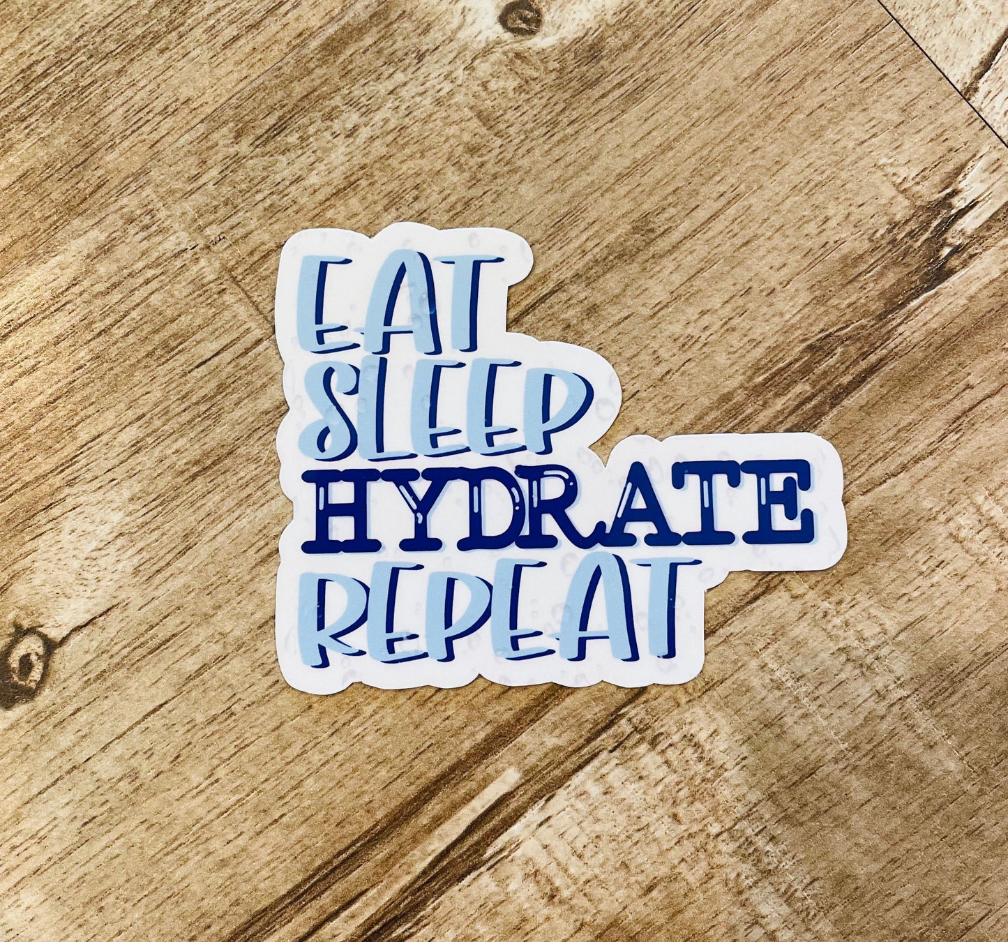 Eat Sleep Hydrate Repeat waterproof sticker